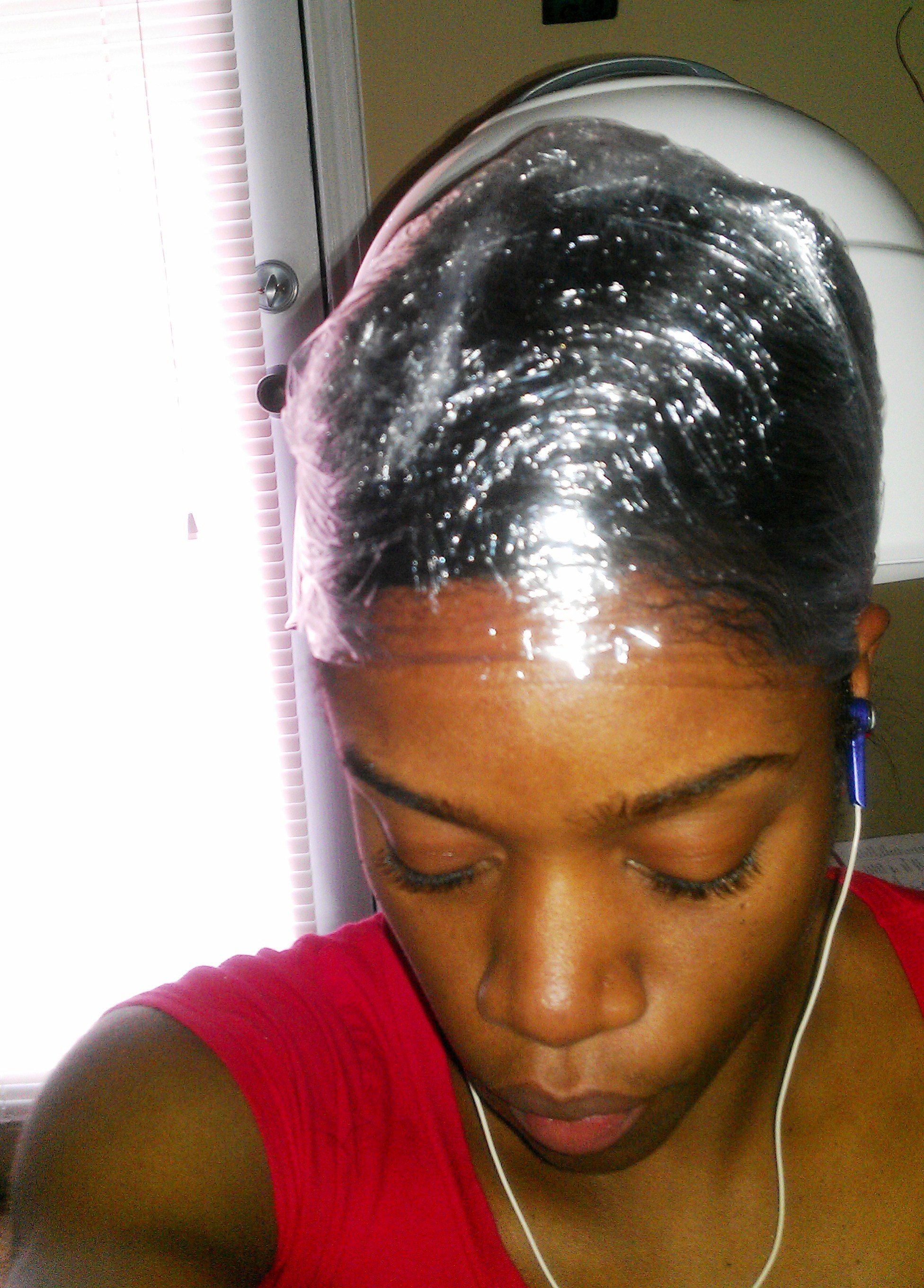 ... wrap then apply good old saran wrap around my head covering my hair